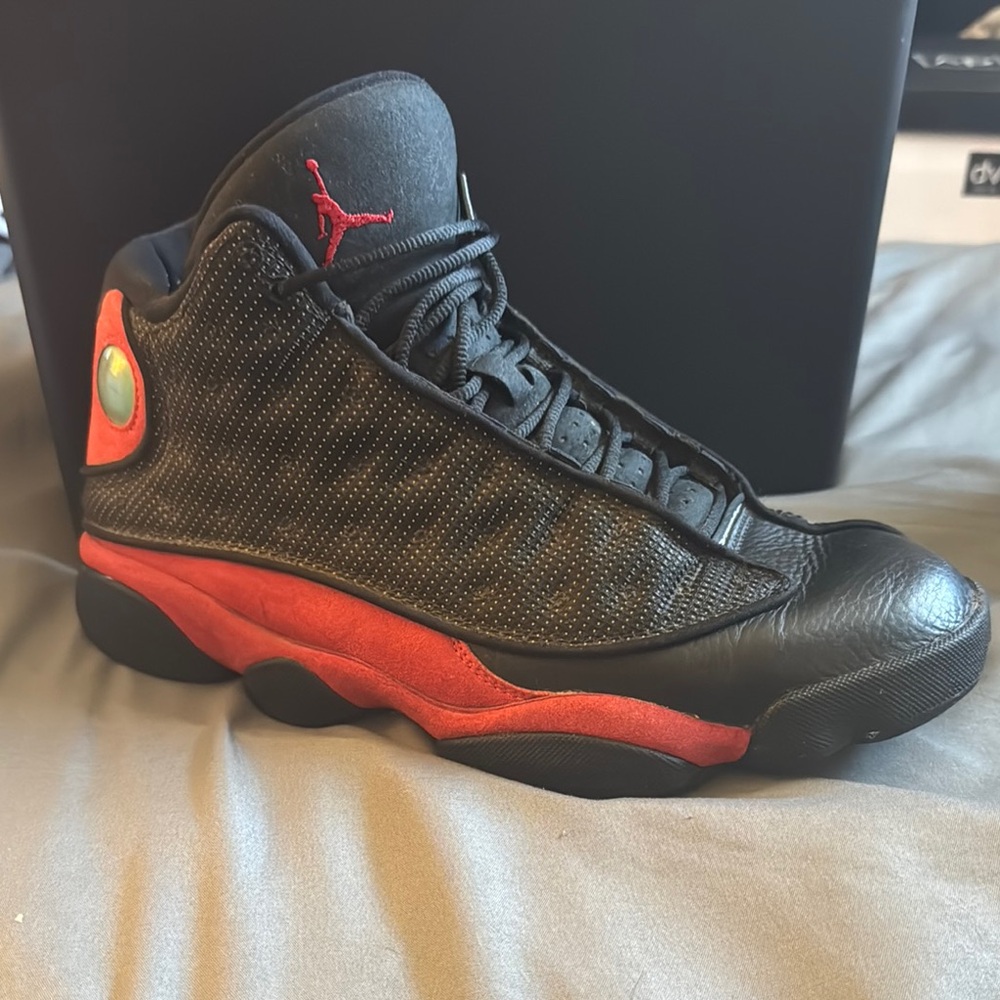 Jordan Black and Red High-Top Sneakers with Quilted Design
